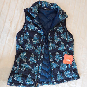 The North Face Jackets & Coats - Women's Navy Floral Down Vest The North Face Jackets & Coats - Women's Navy Floral Down Vest